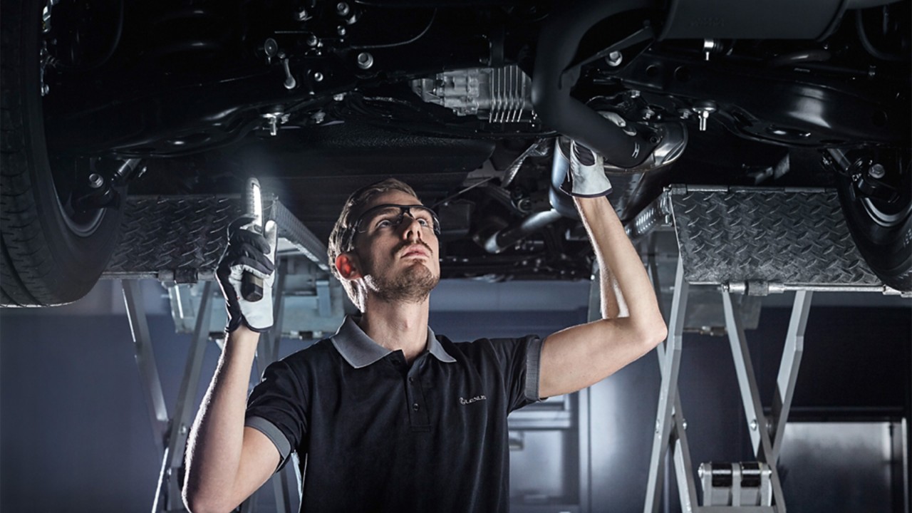 A Lexus mechanic working on a Lexus