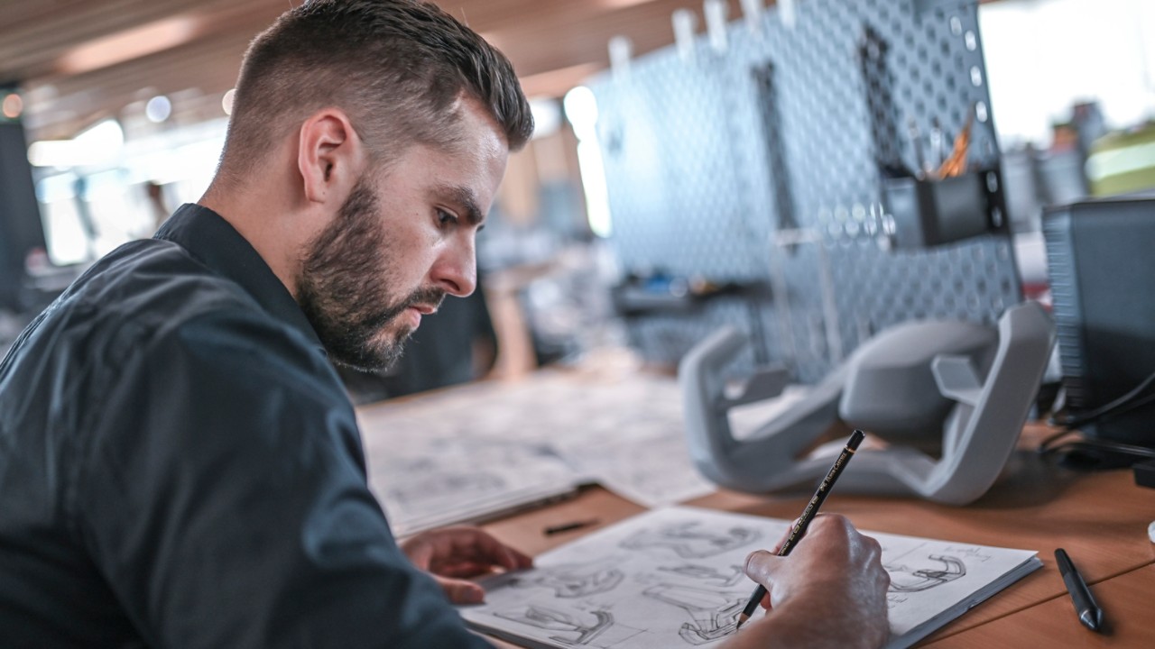 designer-sketching-on-paper